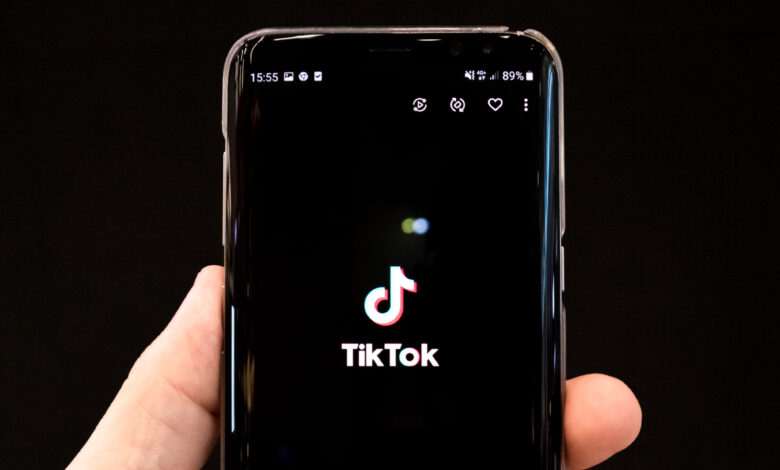 TikTok logo on phone