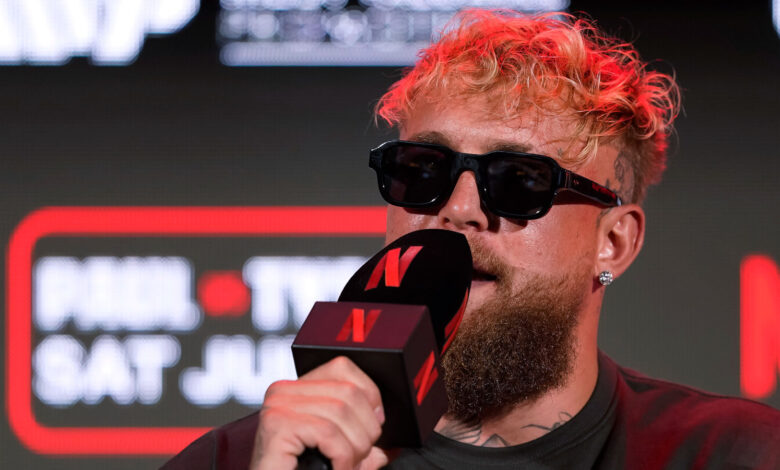 jake paul next to mike perry before their boxing match