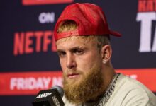 jake paul next to mike perry before their boxing match