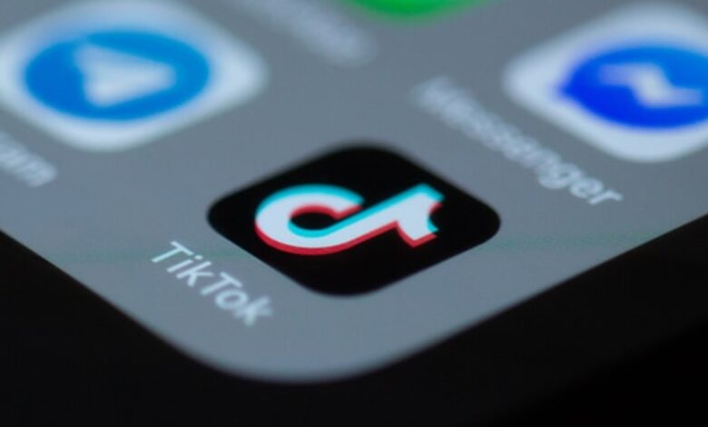 TikTok logo on a phone screen