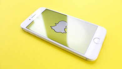 Snapchat logo on yellow background